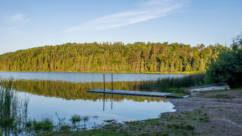 A pier stretching out onto the water on La Salle Lake, Minnesota