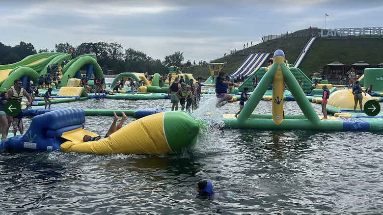 Water park inflatables on the water.