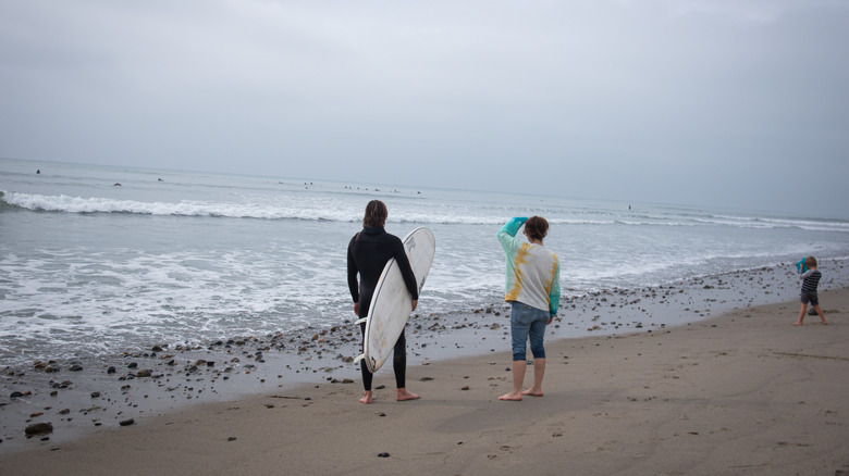 surfers at the san onofre beach