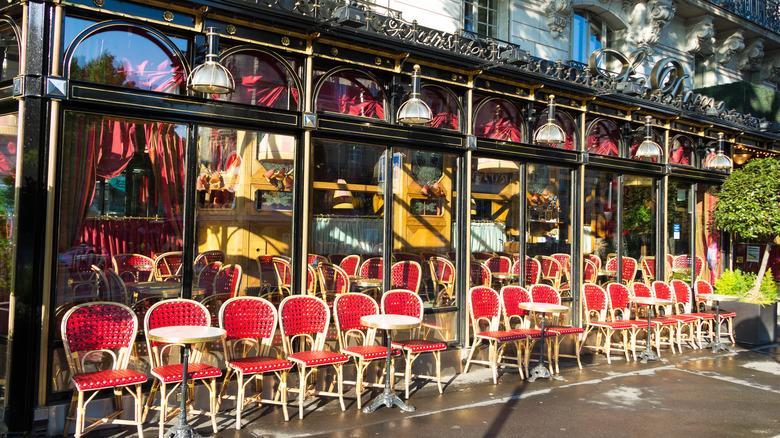 red chairs outside Le Dome restaurant