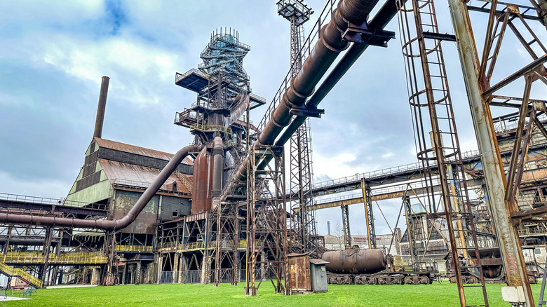 An industrial building with pipes and steel structures