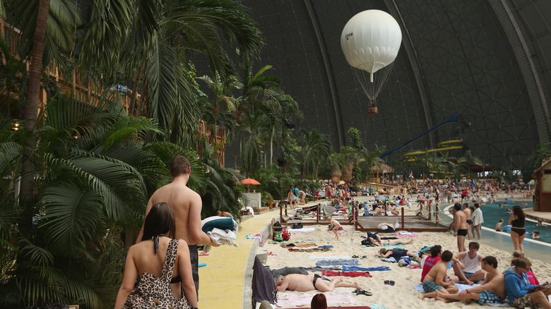 a hot air balloon glides over the beach at Tropical Islands Resort