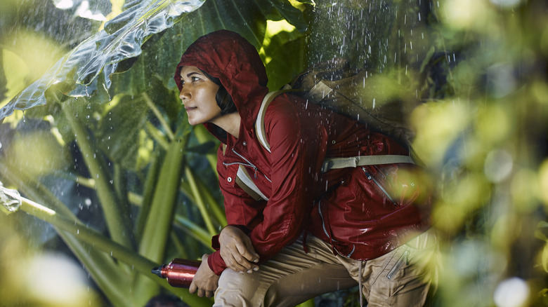 Hiker sheltering from a rainstorm