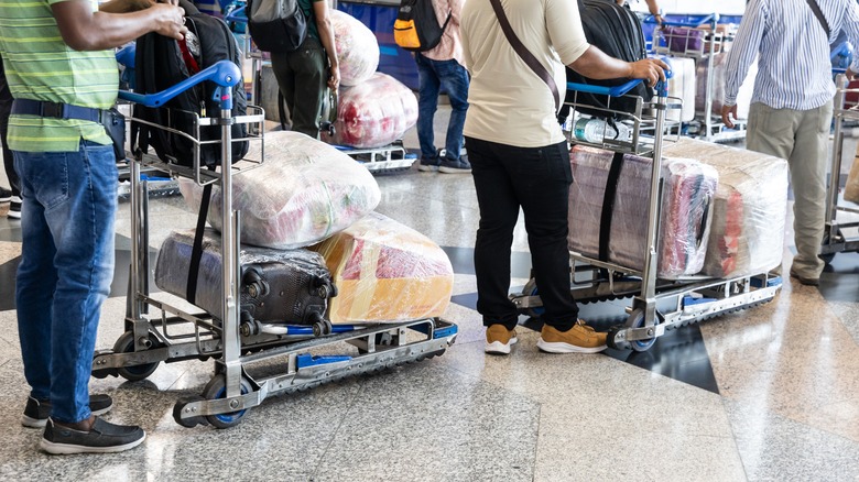 Passengers traveling with wrapped luggage