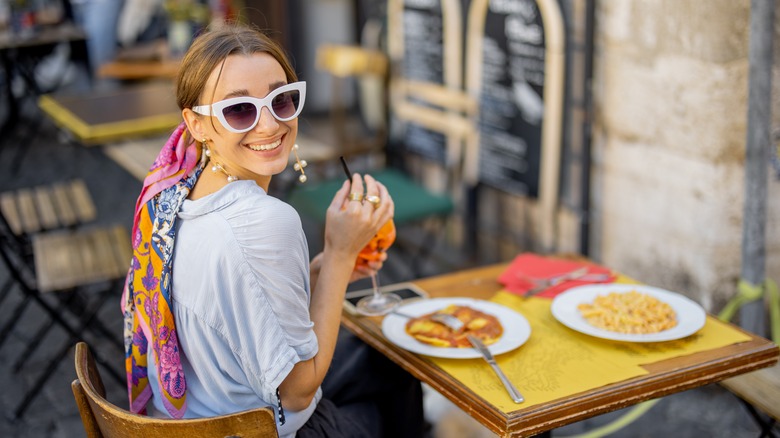 woman sitting at cafe