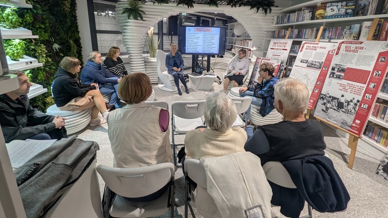 People sitting inside Metroteka Warsaw
