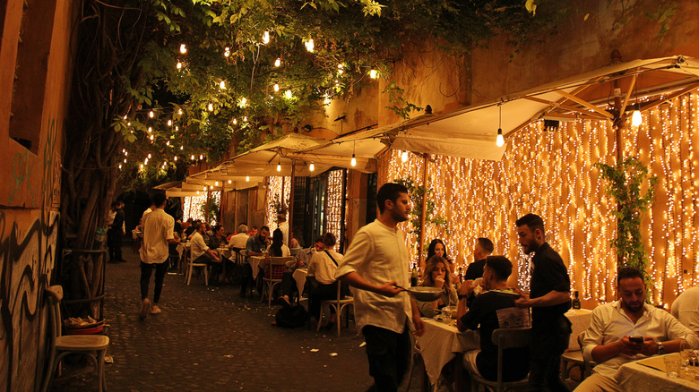 Restaurant terrace at night in Rome