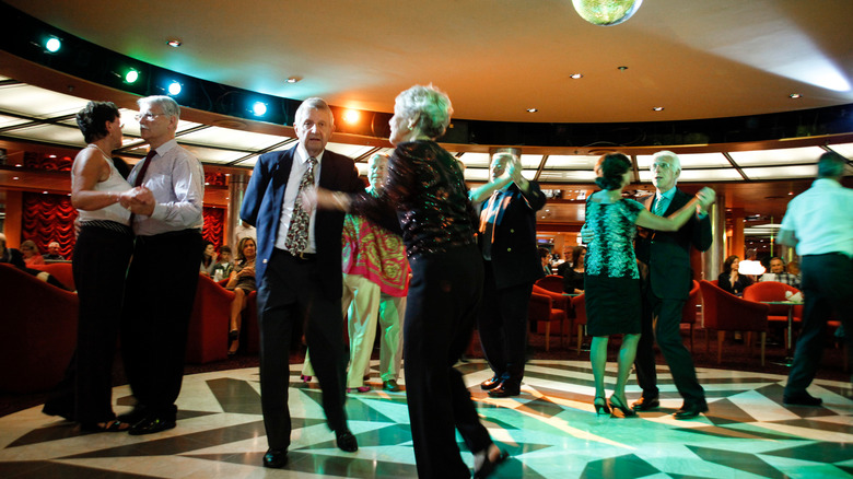 people dancing on cruise ship