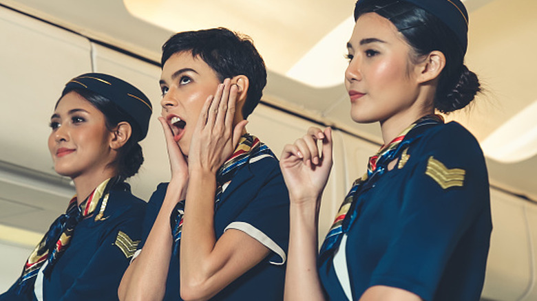 Three rude flight attendants.