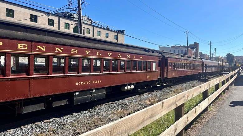 Antique train car idle on tracks in Honesdale, Pennsylvania