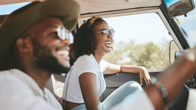 Couple driving in a car