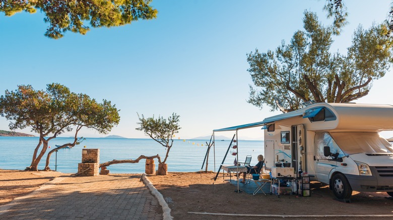 parked RV with awning extended