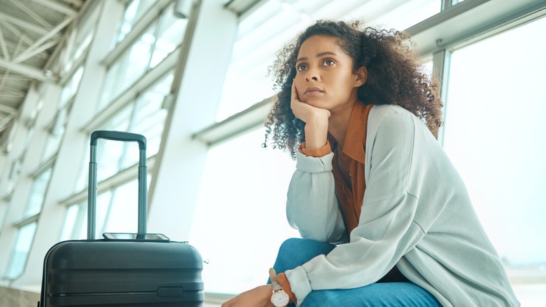 Woman experiencing airport anxiety