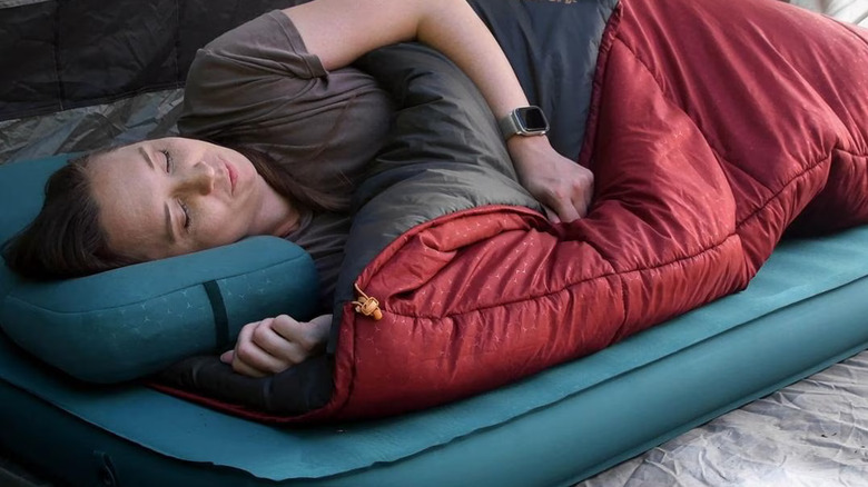 person sleeping on MegaMat