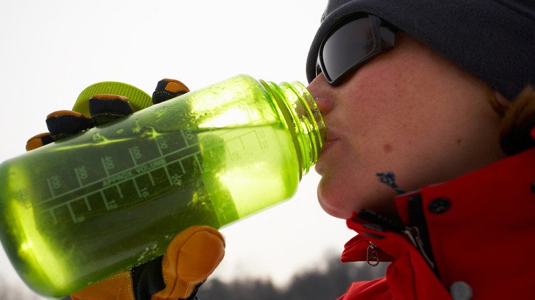 person using Nalgene