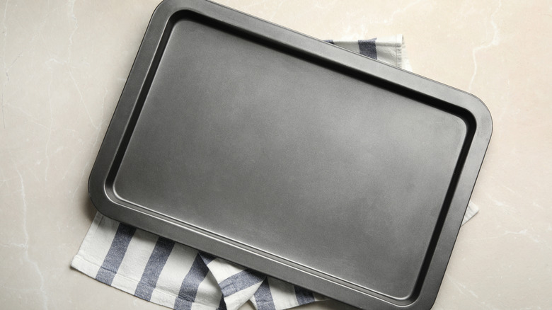 baking sheet and towel
