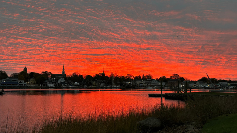 A red sunrise over the Warren River in Barrington, Rhode Island