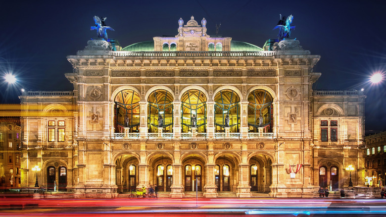 Illuminated facade of the Vienna Opera House at night