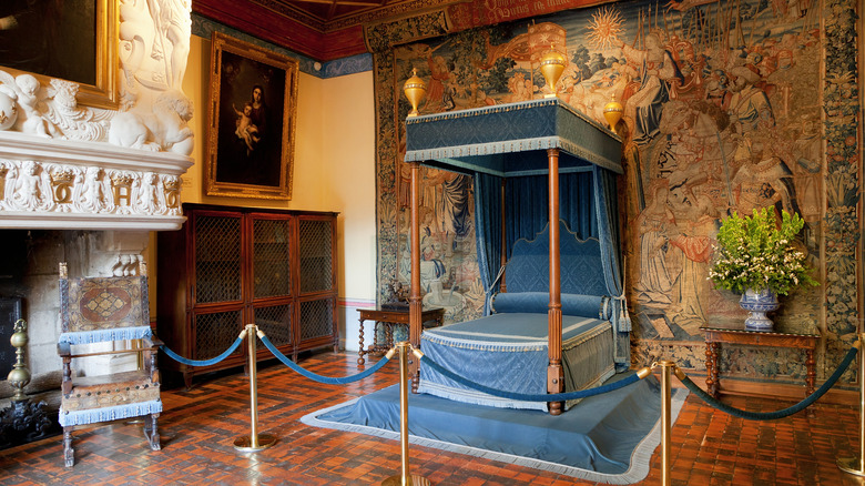the tapestry lined blue bedroom belonging to Diane des Poitiers in the Château de Chenonceau