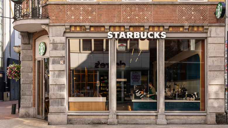 Starbucks coffee store with an old traditional facade in Eindhoven
