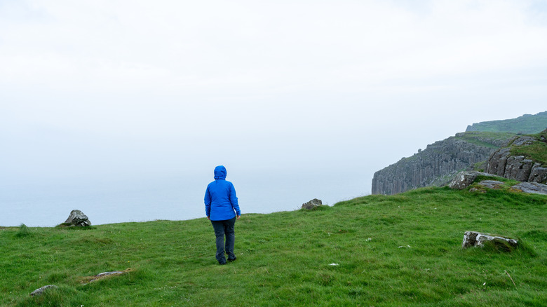 Hiker in a rain jacket in Ireland