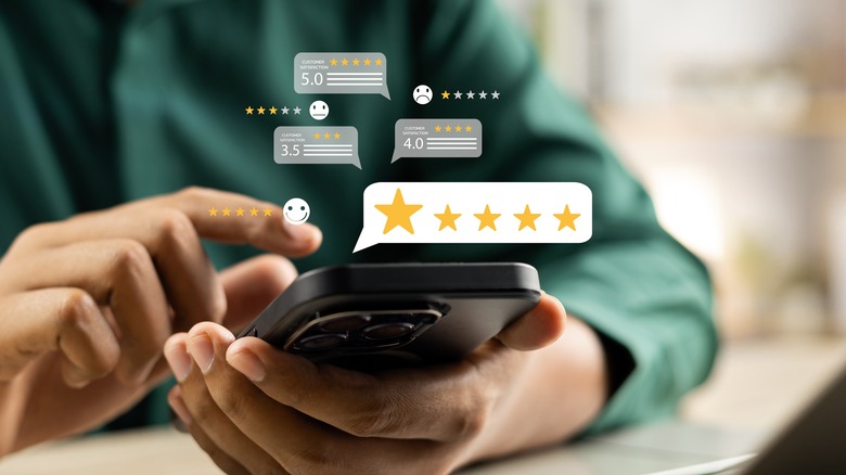 Image of a person leaving a review on a phone