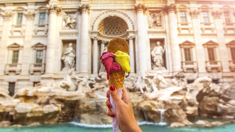 Ice cream cone in front of Trevi fountain
