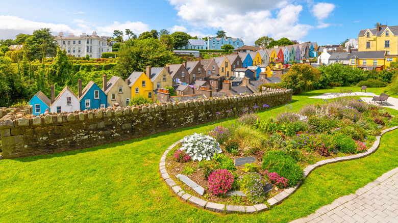 brightly colored houses near an Irish garden