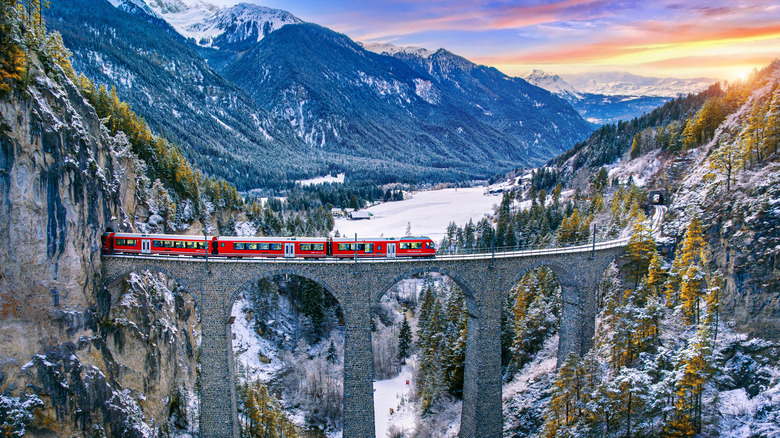train on bridge in Swiss Alps