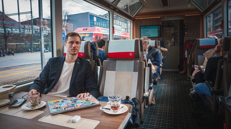 man on board Glacier Express