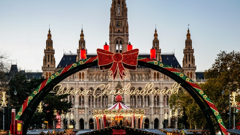 Sign for Vienna Christmas Market with carousel