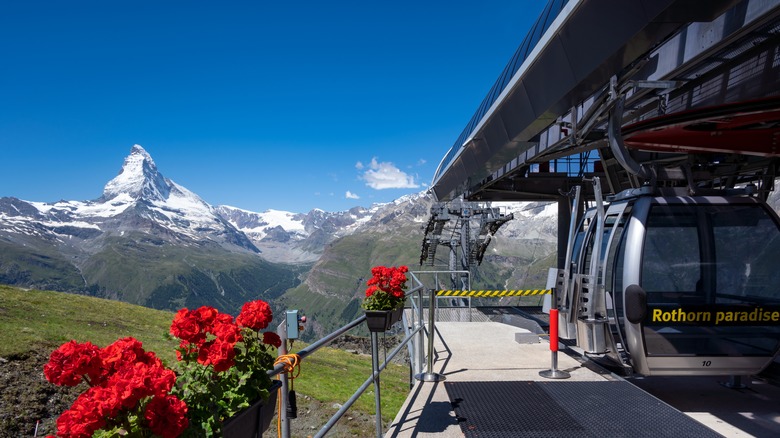 A gondola with the Matterhorn peak in the distance
