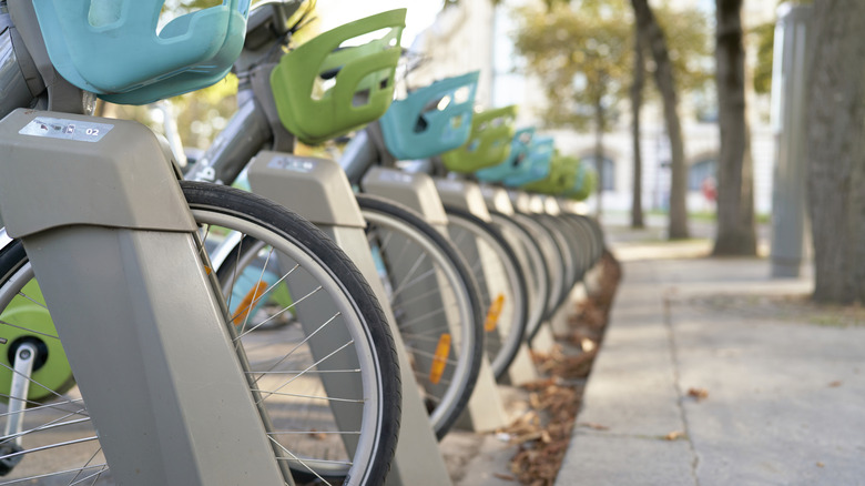 a row of rental bikes in Paris