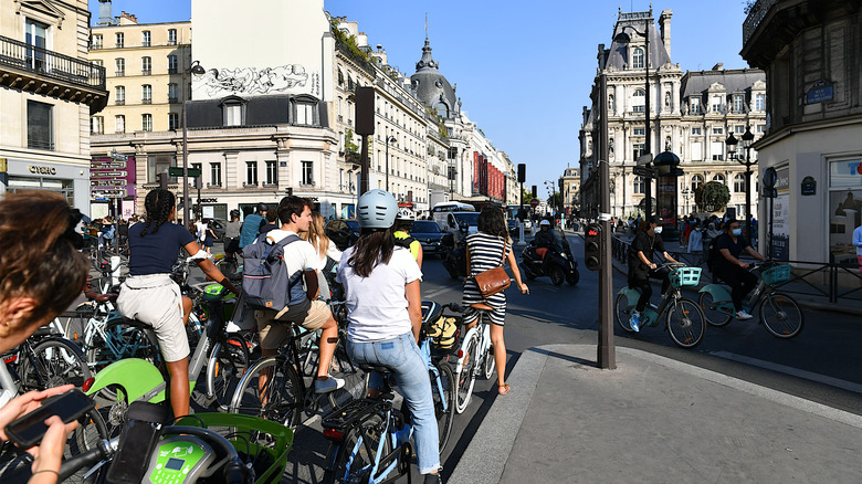 cyclists waiting at a red light