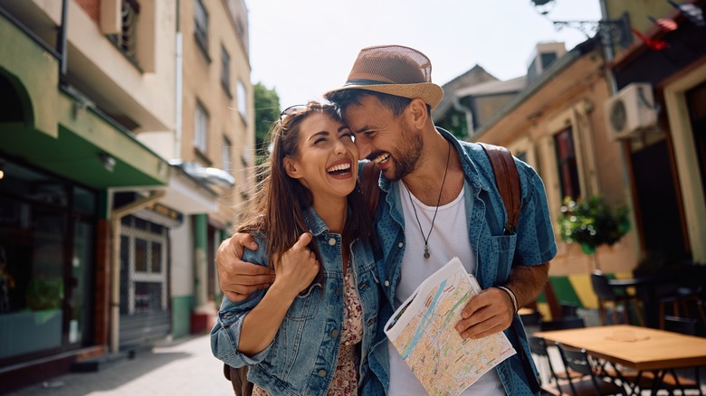 Man and woman walking in Europe
