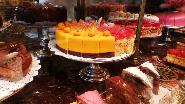 Colorful cakes on display in a shop.