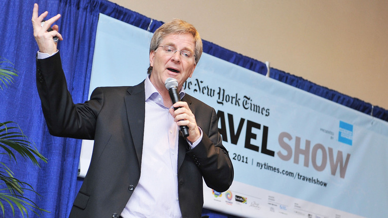 Rick Steves talking at travel show