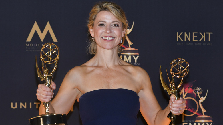 Samantha Brown with Emmy trophies