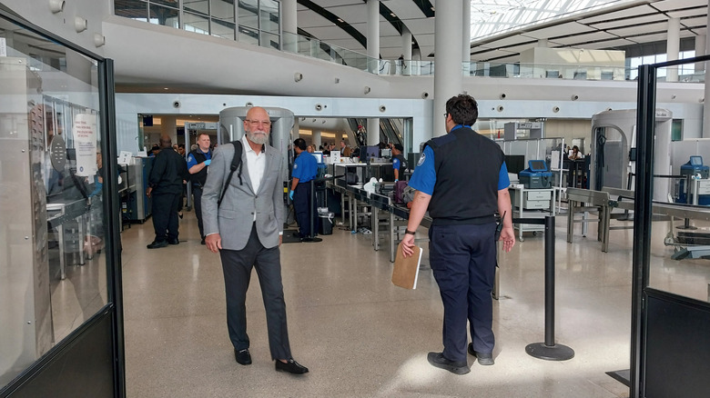man passing through TSA