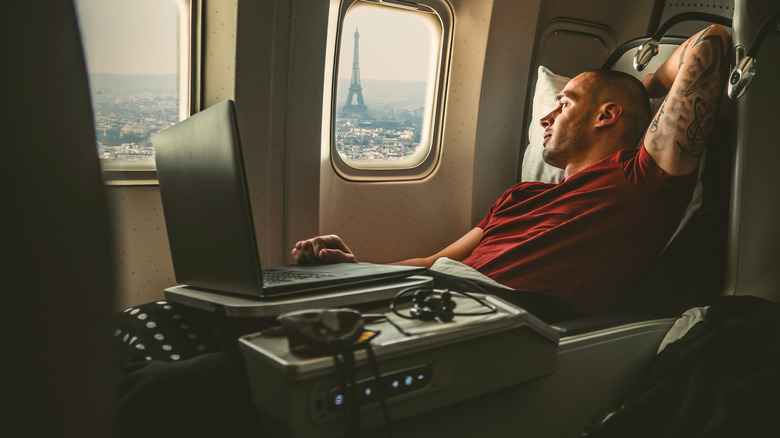 man in a first class seat