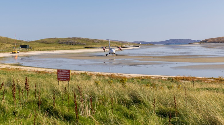Plane at Traigh Mhor beach, Isle of Barra, Scotland