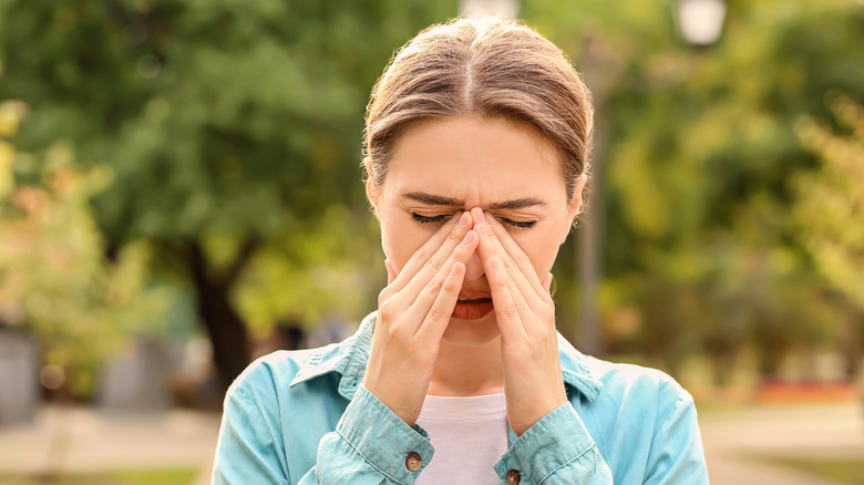 person suffering from allergies