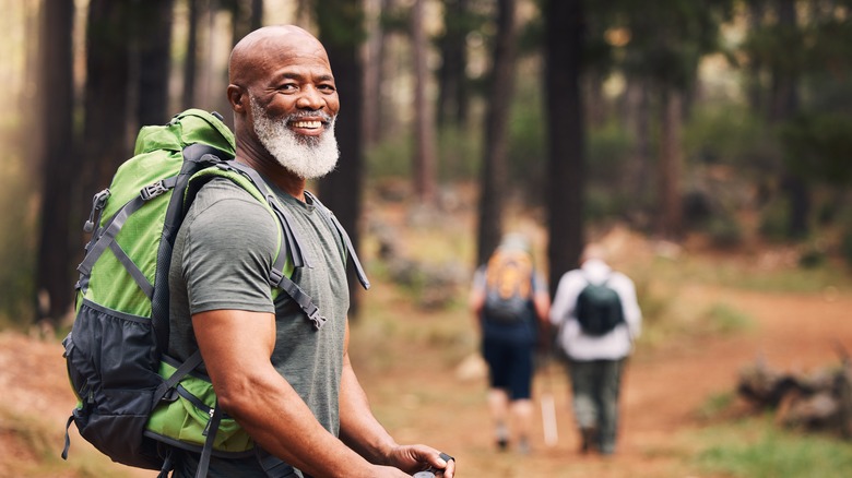 Friendly-looking man hiking