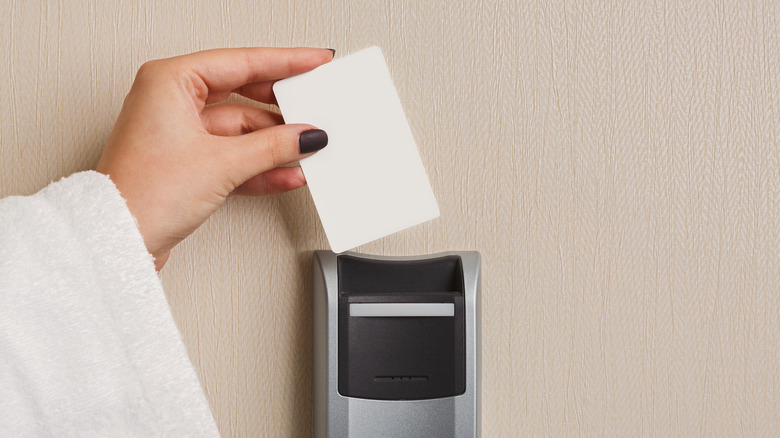 Woman using key card