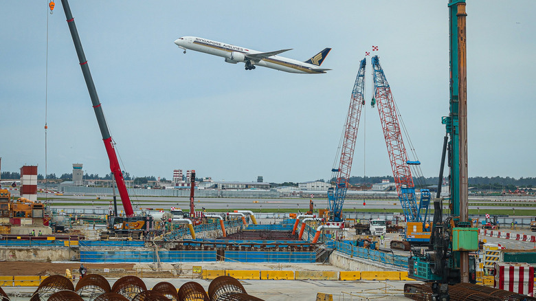 A Singapore Airlines plane takes off in Singapore