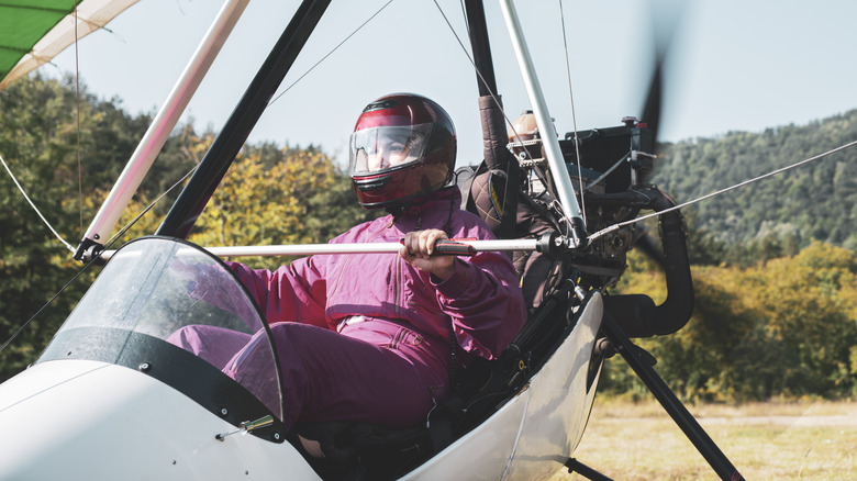 Person taking off hang gliding