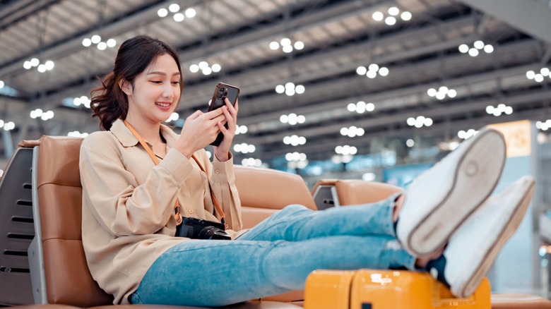 Lady with suitcase in an airport