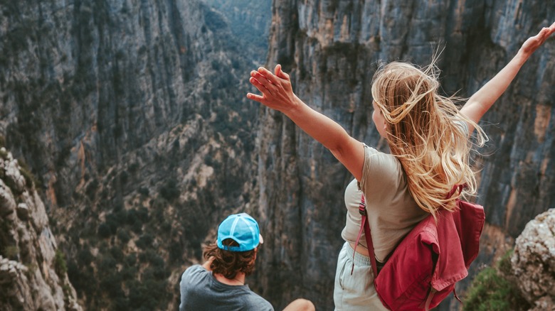 Travelers at a cliff