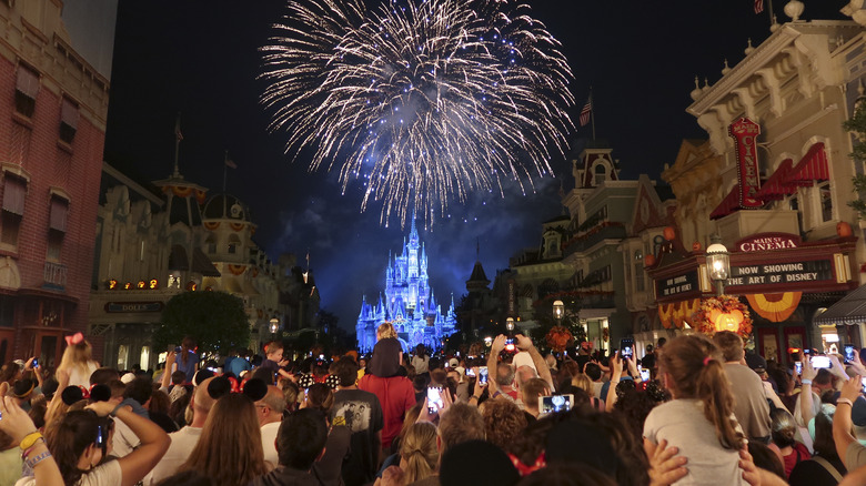 Fireworks crowd Main Street Cinderella Castle