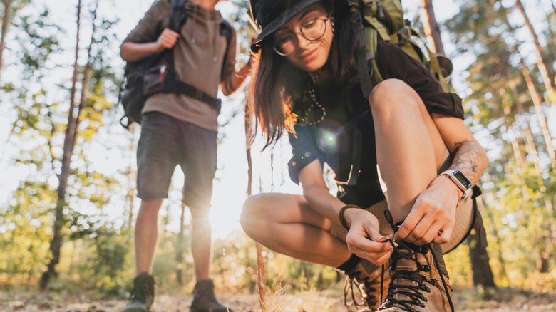 A young couple on a wooded hike